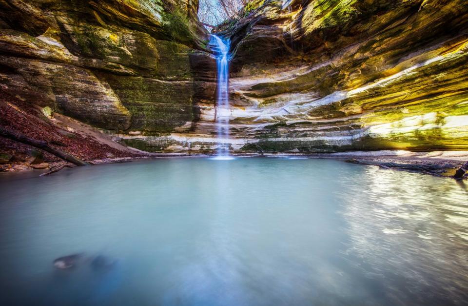 <p><strong>Starved Rock State Park</strong></p><p>Known for its sandstone canyons formed by glacial meltwater, <a href="https://www2.illinois.gov/dnr/Parks/Pages/StarvedRock.aspx" rel="nofollow noopener" target="_blank" data-ylk="slk:Starved Rock State Park;elm:context_link;itc:0;sec:content-canvas" class="link ">Starved Rock State Park</a> in Oglesby, Illinois, is a natural wonder. There’s 13 miles of trails to explore with waterfalls, fishing, and boating.</p>