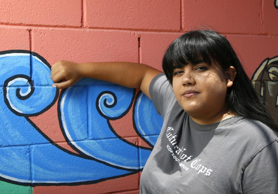 Michelle Ruiz, who started the student-led movement to get police out of schools in the Phoenix Union High School District, shown here at the Puente offices Thursday, June 18, 2020, in Phoenix. School districts around the country are voting to eliminate police from public schools. But this isn’t a sudden reaction to the killing of George Floyd in Minneapolis, but to a years-long movement led by students who say they feel unsafe with police on campus. (AP Photo/Ross D. Franklin)