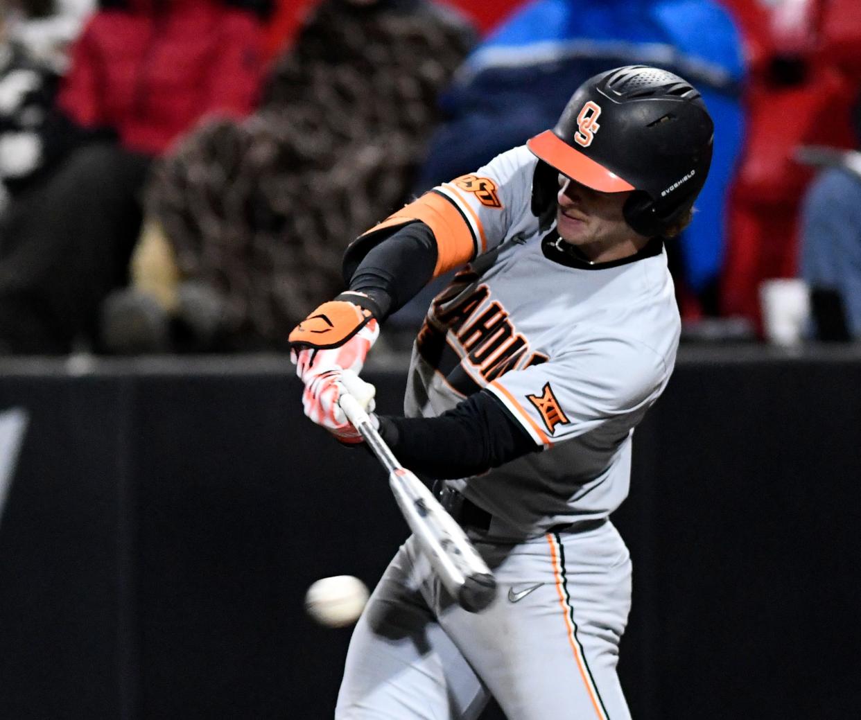 Oklahoma State outfielder Carson Benge takes swing during a March 2023 game against Texas Tech in Lubbock. Benge and the Cowboys host the Red Raiders in a three-game series that starts Friday in Stillwater, Oklahoma.