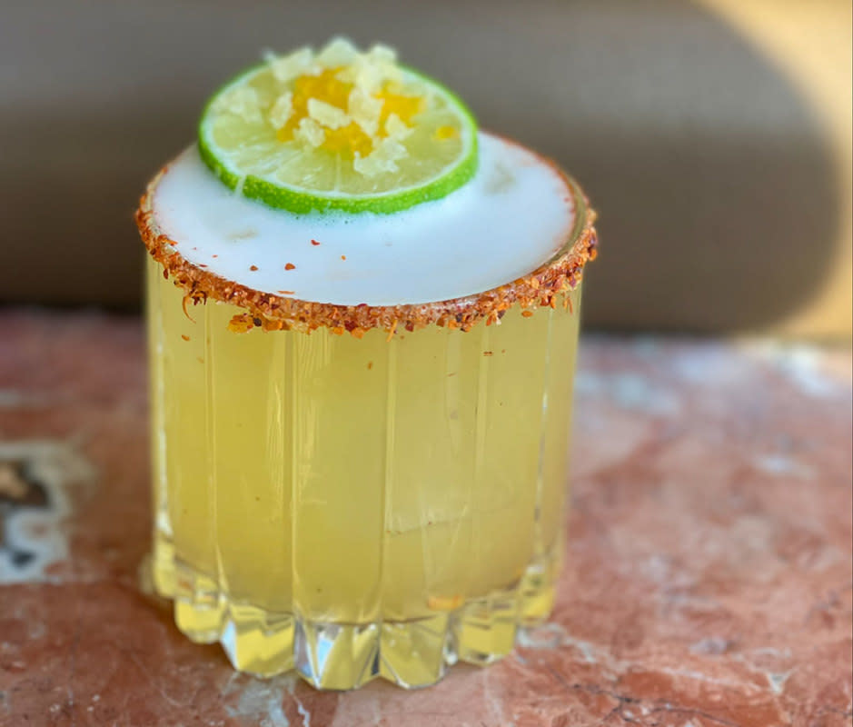 <p>Courtesy Image</p><p>Spicy Passion elevates the spicy marg by incorporating passionfruit, ginger liqueur, and a fiery kick from habanero. "Balanced with lime juice, homemade mango-cardamom syrup, and triple sec, it's a symphony of sweet, spicy, and tangy flavors,” says Sayora Khamidova, general manager of <a href="https://jimmysoho.com/" rel="nofollow noopener" target="_blank" data-ylk="slk:JIMMY;elm:context_link;itc:0;sec:content-canvas" class="link ">JIMMY</a> in New York, NY.</p>Ingredients<ul><li>2 oz reposado tequila, like <a href="https://clicks.trx-hub.com/xid/arena_0b263_mensjournal?event_type=click&q=https%3A%2F%2Fgo.skimresources.com%2F%3Fid%3D106246X1712071%26xs%3D1%26xcust%3DMj-besttequilacocktails-aclausen-0224%26url%3Dhttps%3A%2F%2Fwww.caskers.com%2Fpatron-reposado-tequila%2F&p=https%3A%2F%2Fwww.mensjournal.com%2Ffood-drink%2Ftequila-cocktails%3Fpartner%3Dyahoo&ContentId=ci02d58db58000278d&author=Austa%20Somvichian-Clausen&page_type=Article%20Page&partner=yahoo&section=reposado%20tequila&site_id=cs02b334a3f0002583&mc=www.mensjournal.com" rel="nofollow noopener" target="_blank" data-ylk="slk:Arette Reposado Tequila;elm:context_link;itc:0;sec:content-canvas" class="link ">Arette Reposado Tequila</a></li><li>1 oz habanero tequila, like <a href="https://clicks.trx-hub.com/xid/arena_0b263_mensjournal?event_type=click&q=https%3A%2F%2Fgo.skimresources.com%2F%3Fid%3D106246X1712071%26xs%3D1%26xcust%3DMj-besttequilacocktails-aclausen-0224%26url%3Dhttps%3A%2F%2Fwww.caskers.com%2Ftanteo-habanero-tequila%2F&p=https%3A%2F%2Fwww.mensjournal.com%2Ffood-drink%2Ftequila-cocktails%3Fpartner%3Dyahoo&ContentId=ci02d58db58000278d&author=Austa%20Somvichian-Clausen&page_type=Article%20Page&partner=yahoo&section=reposado%20tequila&site_id=cs02b334a3f0002583&mc=www.mensjournal.com" rel="nofollow noopener" target="_blank" data-ylk="slk:Tanteo Habanero Tequila;elm:context_link;itc:0;sec:content-canvas" class="link ">Tanteo Habanero Tequila</a></li><li>0.75 oz passionfruit liqueur, like <a href="https://clicks.trx-hub.com/xid/arena_0b263_mensjournal?event_type=click&q=https%3A%2F%2Fgo.skimresources.com%2F%3Fid%3D106246X1712071%26xs%3D1%26xcust%3DMj-besttequilacocktails-aclausen-0224%26url%3Dhttps%3A%2F%2Fwww.caskers.com%2Fchinola-passion-fruit-liqueur%2F&p=https%3A%2F%2Fwww.mensjournal.com%2Ffood-drink%2Ftequila-cocktails%3Fpartner%3Dyahoo&ContentId=ci02d58db58000278d&author=Austa%20Somvichian-Clausen&page_type=Article%20Page&partner=yahoo&section=reposado%20tequila&site_id=cs02b334a3f0002583&mc=www.mensjournal.com" rel="nofollow noopener" target="_blank" data-ylk="slk:Chinola Passion Fruit Liqueur;elm:context_link;itc:0;sec:content-canvas" class="link ">Chinola Passion Fruit Liqueur</a></li><li>0.75 oz ginger liqueur, like <a href="https://clicks.trx-hub.com/xid/arena_0b263_mensjournal?event_type=click&q=https%3A%2F%2Fgo.skimresources.com%3Fid%3D106246X1712071%26xs%3D1%26xcust%3DMj-besttequilacocktails-aclausen-0224%26url%3Dhttps%3A%2F%2Fwww.totalwine.com%2Fspirits%2Fliqueurscordialsschnapps%2Fherbal-spice%2Fginger%2Fdomaine-de-canton-ginger-liqueur%2Fp%2F15575375&p=https%3A%2F%2Fwww.mensjournal.com%2Ffood-drink%2Ftequila-cocktails%3Fpartner%3Dyahoo&ContentId=ci02d58db58000278d&author=Austa%20Somvichian-Clausen&page_type=Article%20Page&partner=yahoo&section=reposado%20tequila&site_id=cs02b334a3f0002583&mc=www.mensjournal.com" rel="nofollow noopener" target="_blank" data-ylk="slk:Domaine de Canton Ginger Liqueur;elm:context_link;itc:0;sec:content-canvas" class="link ">Domaine de Canton Ginger Liqueur</a></li><li>0.75 oz lime juice</li><li>0.5 oz triple sec</li><li>0.5 oz mango-cardamom syrup*</li><li>Lime wheel, dried mango, and caramelized ginger, for garnish</li></ul>Instructions<ol><li>Combine all ingredients, except garnish, in a shaker filled with ice.</li><li>Shake well, then pour over fresh ice in a tajín-rimmed rocks glass.</li><li>Garnish with a lime wheel, diced dried mango, and diced caramelized ginger.</li></ol>