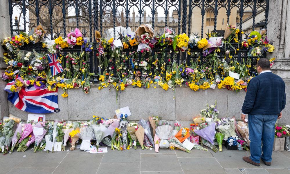 Flowers at the parliament buildings in London pay tribute to those killed by Khalid Masood. 