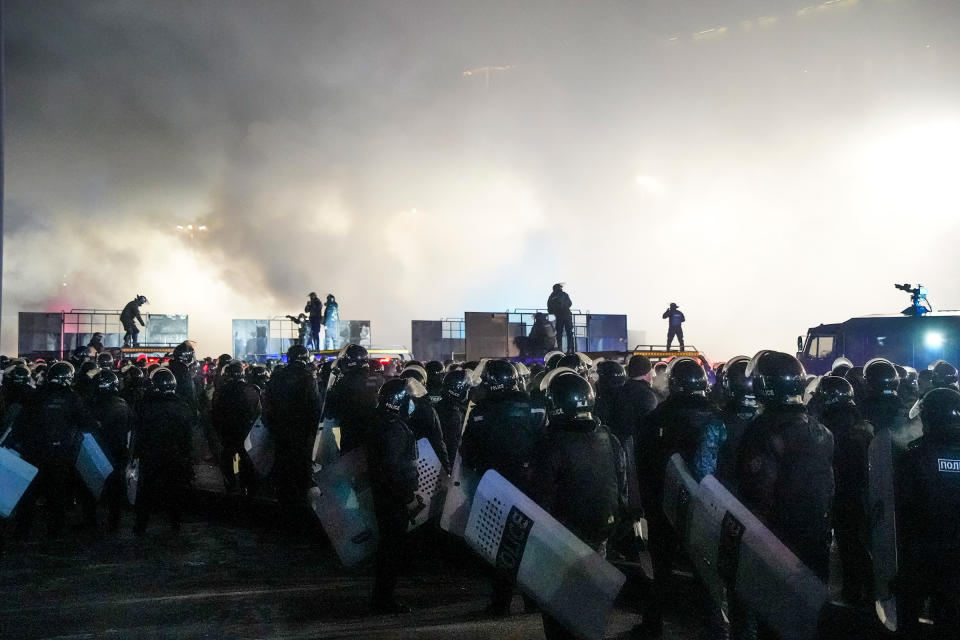 Riot police block protesters in the center of Almaty, Kazakhstan, Jan. 5, 2022.<span class="copyright">Vladimir Tretyakov—AP</span>