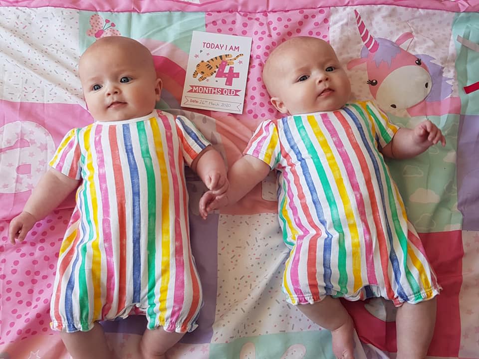 A mum of identical twin has faced a medical nightmare - one sister is perfectly healthy while the other is struck down with a rare illness from coronavirus.  Mum Hannah Godwin spotted five-month-old Leia with a rash and high temperature next to her "healthy and happy" twin.  It struck her even more because identical twin Thea was completely fine - and the difference may have saved her sister's life.  Little Leia was rushed to hospital in the nick of time to be treated for an inflammatory disease in young children linked with an extreme reaction to Covid-19.  Pictured here are twins Leia (left) & Thea.  © Hannah Godwin/WALES NEWS SERVICE    