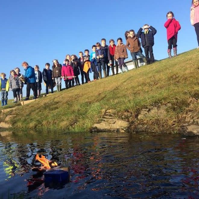 The children watch as the burning ship floats away (credit: Papdale primary)