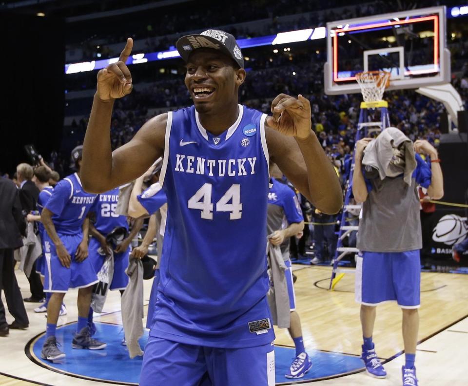 Kentucky's Dakari Johnson celebrates after an NCAA Midwest Regional final college basketball tournament game against Michigan Sunday, March 30, 2014, in Indianapolis. Kentucky won 75-72 to advance to the Final Four. (AP Photo/David J. Phillip)