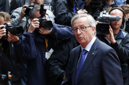 Luxembourg's then Prime Minister Jean Claude Juncker arrives at a European Union leaders summit in Brussels in this June 27, 2013 file photo. REUTERS/Yves Herman/Files