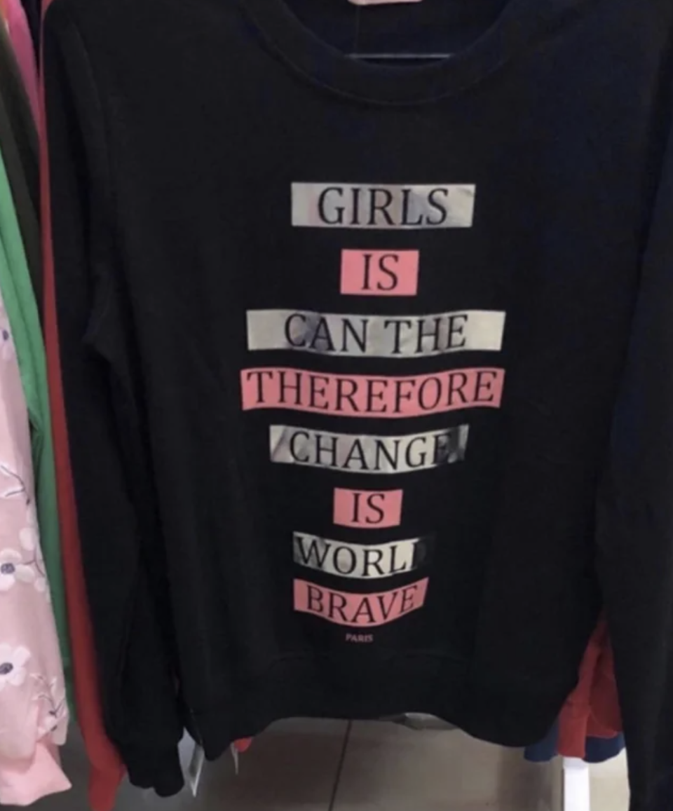 A shirt that says "Girls Is Can the Therefore Change Is World Brave"