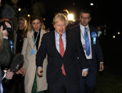 Britain's Prime Minister and Conservative Party leader Boris Johnson and his partner Carrie Symonds arrives for the Uxbridge and South Ruislip constituency count declaration at Brunel University in Uxbridge, London, Friday, Dec. 13, 2019. (AP Photo/Kirsty Wigglesworth)