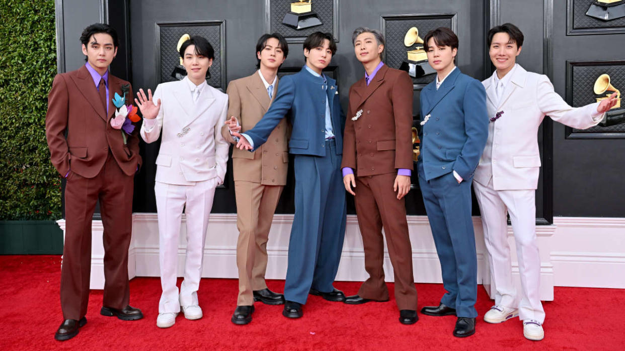 LAS VEGAS, NEVADA - APRIL 03: (L-R) V, Suga, Jin, Jungkook, RM, Jimin and J-Hope of BTS attends the 64th Annual GRAMMY Awards at MGM Grand Garden Arena on April 03, 2022 in Las Vegas, Nevada. (Photo by Axelle/Bauer-Griffin/FilmMagic)