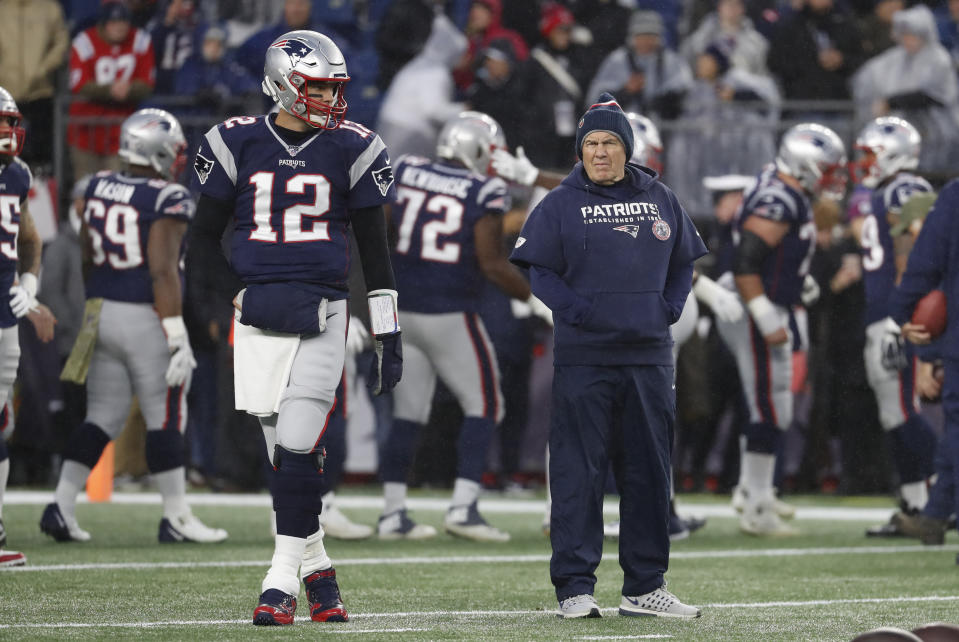 New England Patriots quarterback Tom Brady (12) and New England Patriots head coach Bill Belichick during warm up before a game between the New England Patriots and the Dallas Cowboys on November 24, 2019, at Gillette Stadium in Foxborough, Massachusetts. (Photo by Fred Kfoury III/Icon Sportswire via Getty Images)