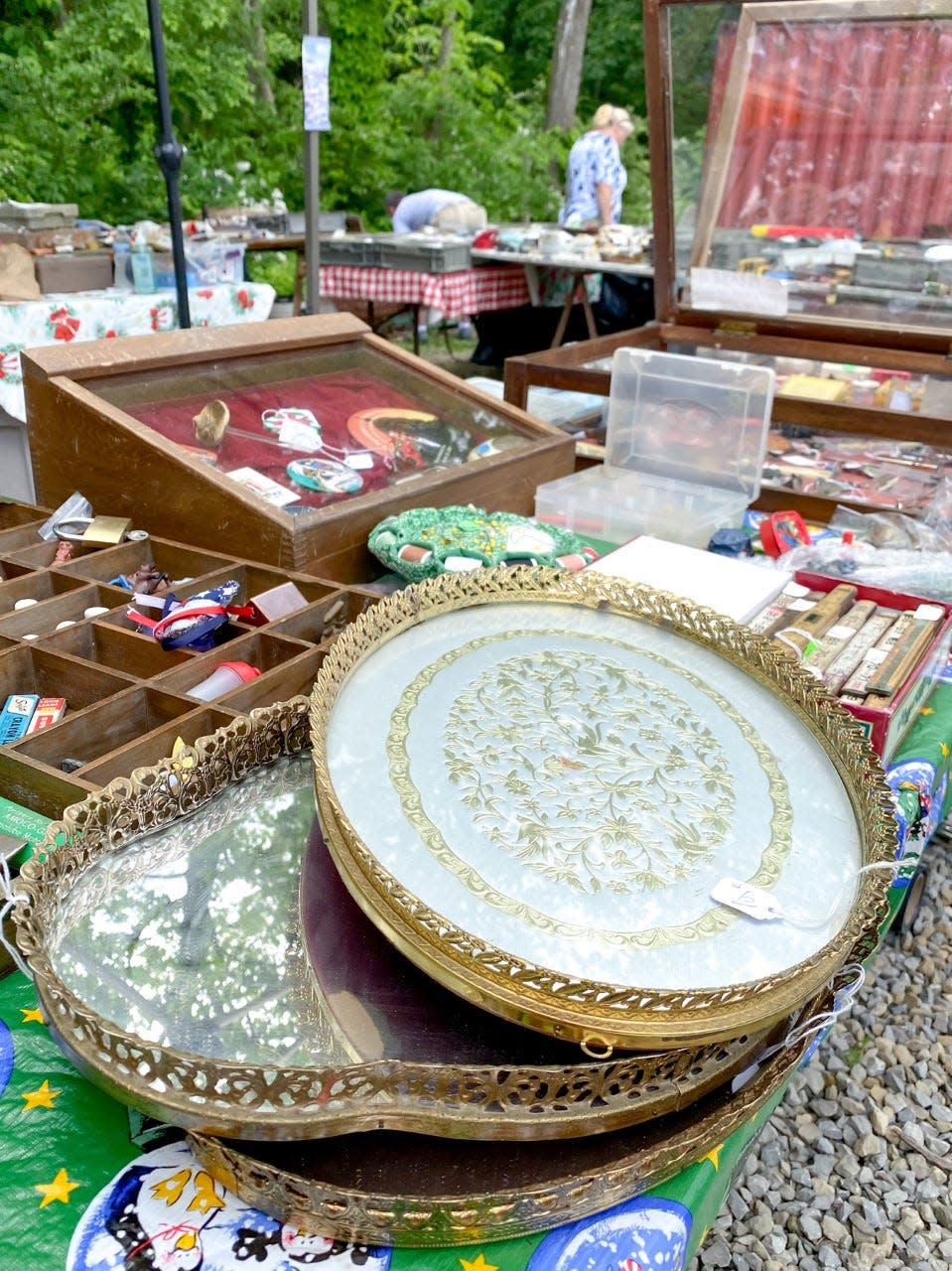 Various jewelry trays, knick-knacks, and more are for sale during the National Road yard sale festival. The four-day-long event spans from Illinois to Maryland.