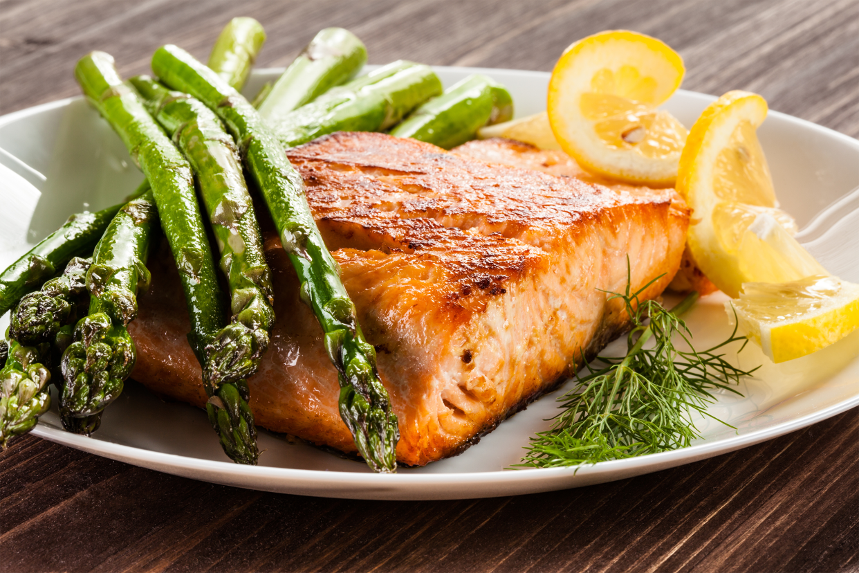 Healthy salmon meal with asparagus