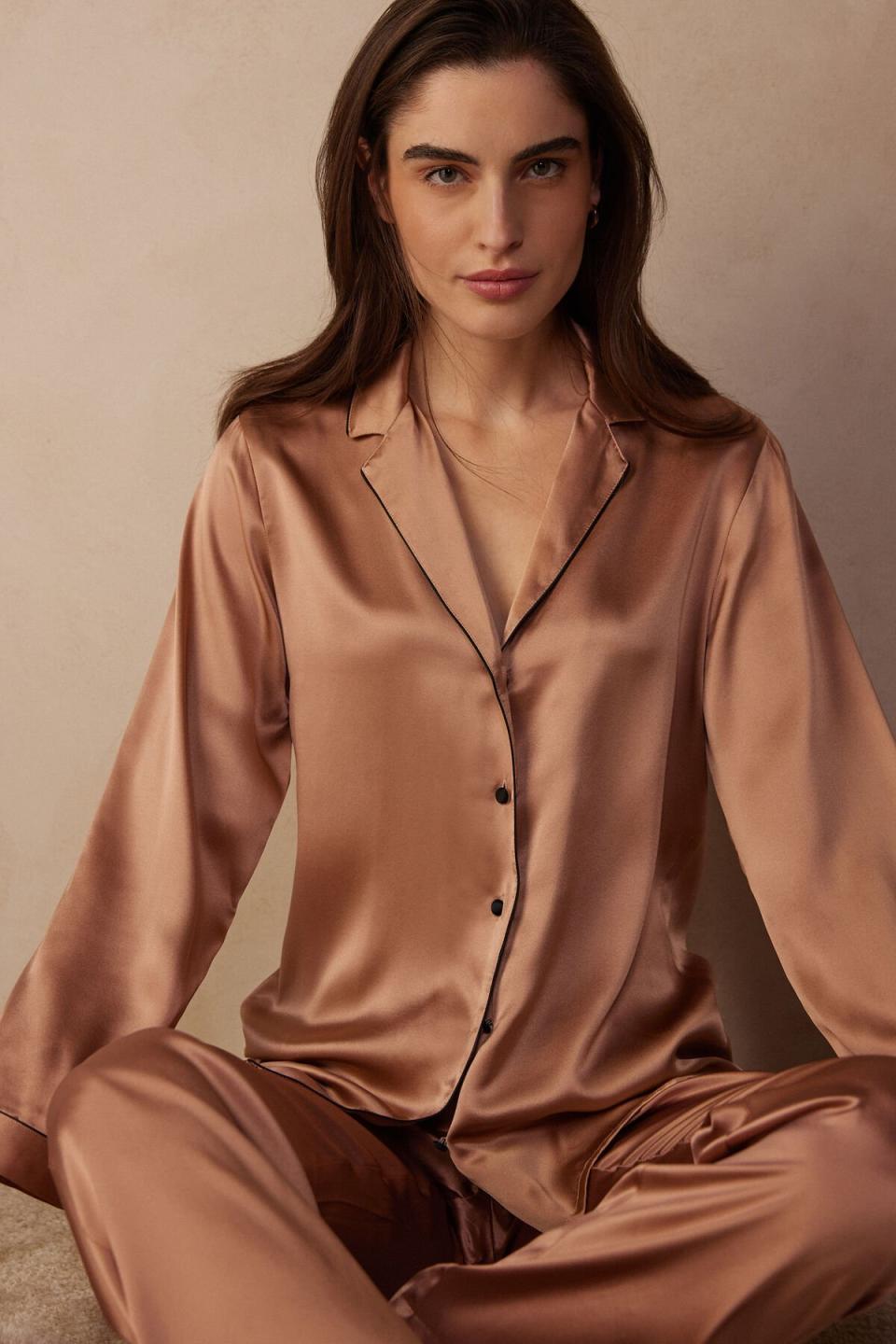 model wearing brown silky pajama top