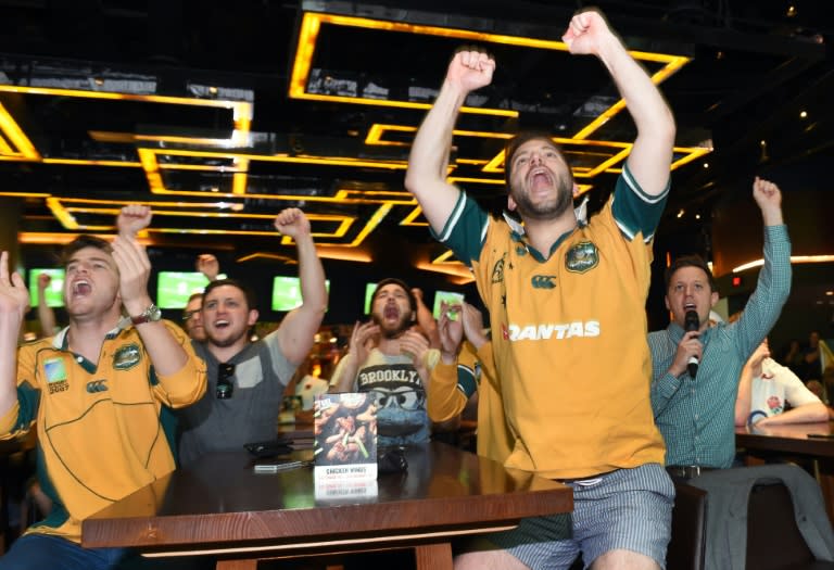 Australian fans watch the action in the Rugby World Cup Pool A match between Australia and England, in a Sydney pub, on October 4, 2015