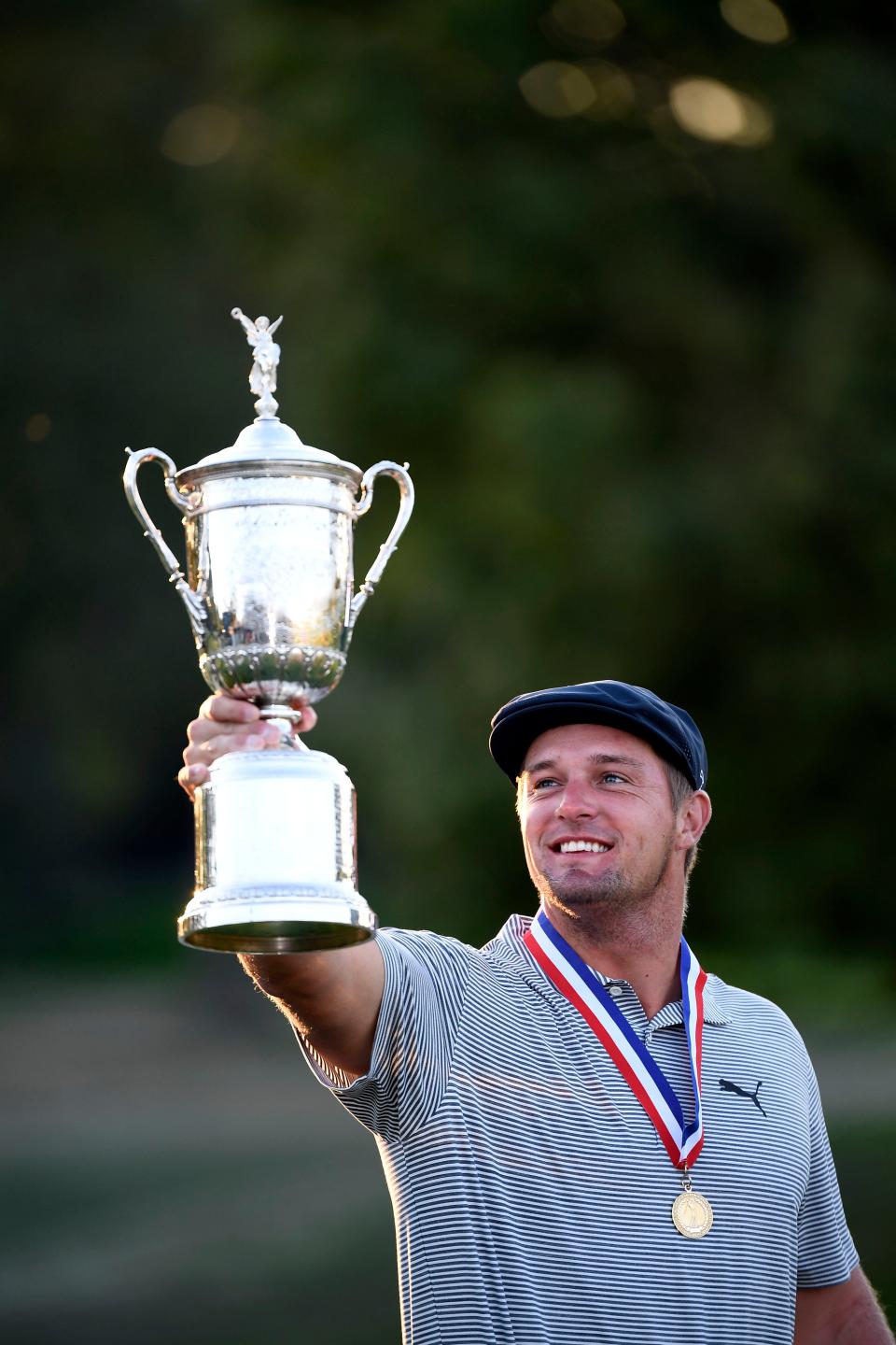 Sep 20, 2020; Mamaroneck, New York, USA; Bryson DeChambeau celebrates with the trophy after winning the U.S. Open golf tournament at Winged Foot Golf Club - West. Mandatory Credit: Danielle Parhizkaran-USA TODAY Sports