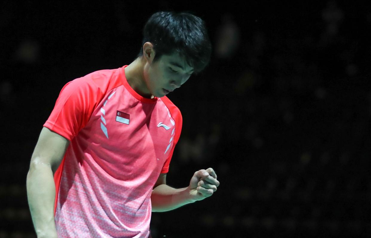 Singapore shuttler Loh Kean Yew celebrates winning a point against France's Thomas Rouxel at the Badminton World Championships. (PHOTO: BadmintonPhoto)