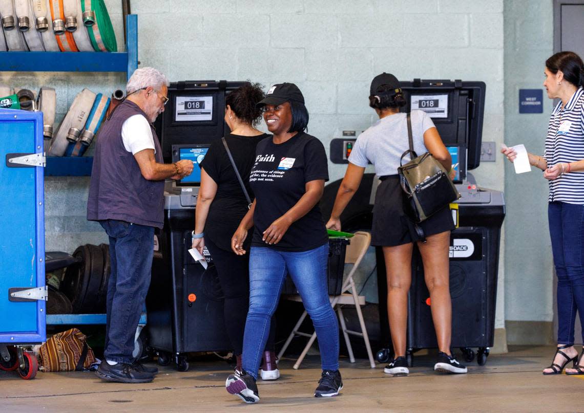 Poll workers and voters at the Miami Beach Fire Department Station 4 precinct on Tuesday, Nov. 8, 2022, in Miami Beach, Florida.