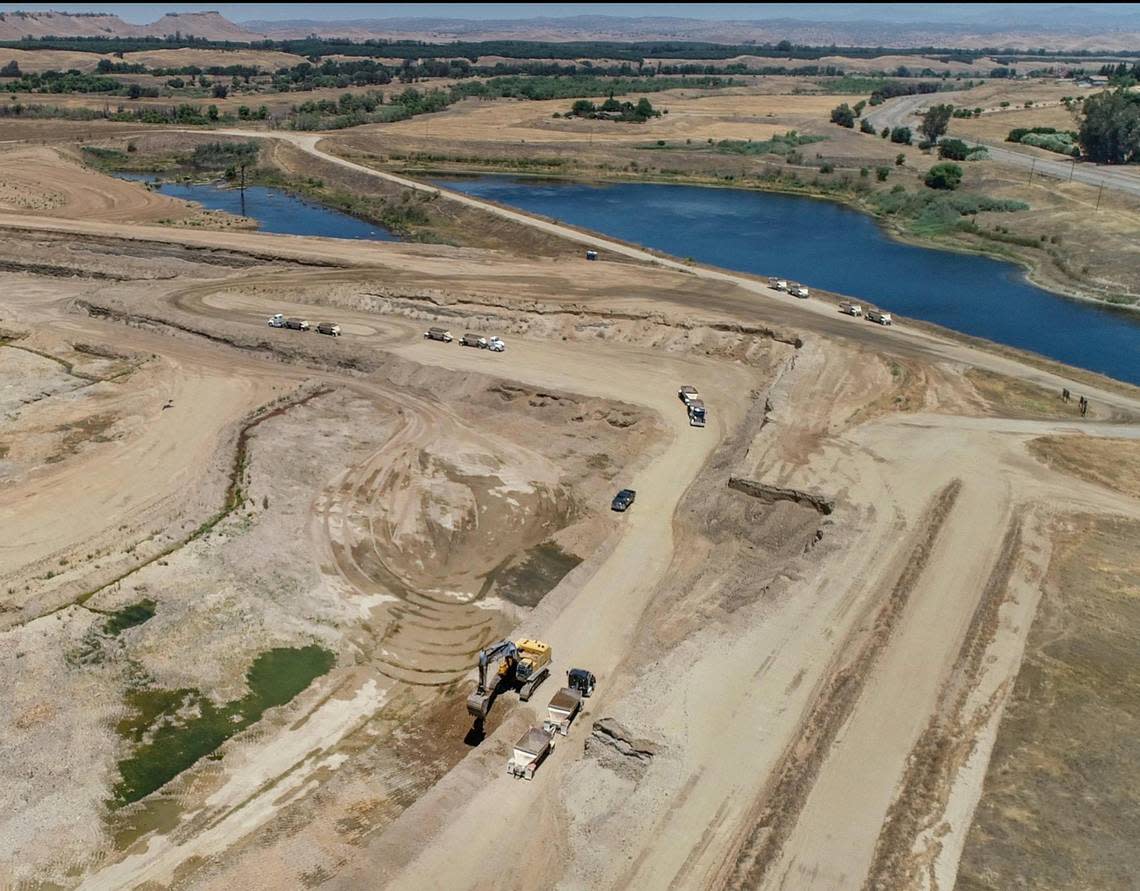 The CEMEX quarry site is seen in this drone image about a mile-and-a-half down the road from the company’s Rockfield aggregate plant in Friant on Wednesday, June 17, 2020. The company applied to Fresno County to continue mining the quarry for 100 years, and use blasting and drilling to mine a 600-ft deep pit.