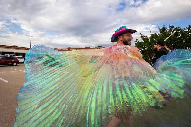 A smiling Tyler Huckabee spreads his cape early this month in Watauga, Texas, while protesting in front of Stedfast Baptist Church, where a pastor preaches against homosexuality. (Photo: Yffy Yossifor/Fort Worth Star-Telegram/Tribune News Service via Getty Image)