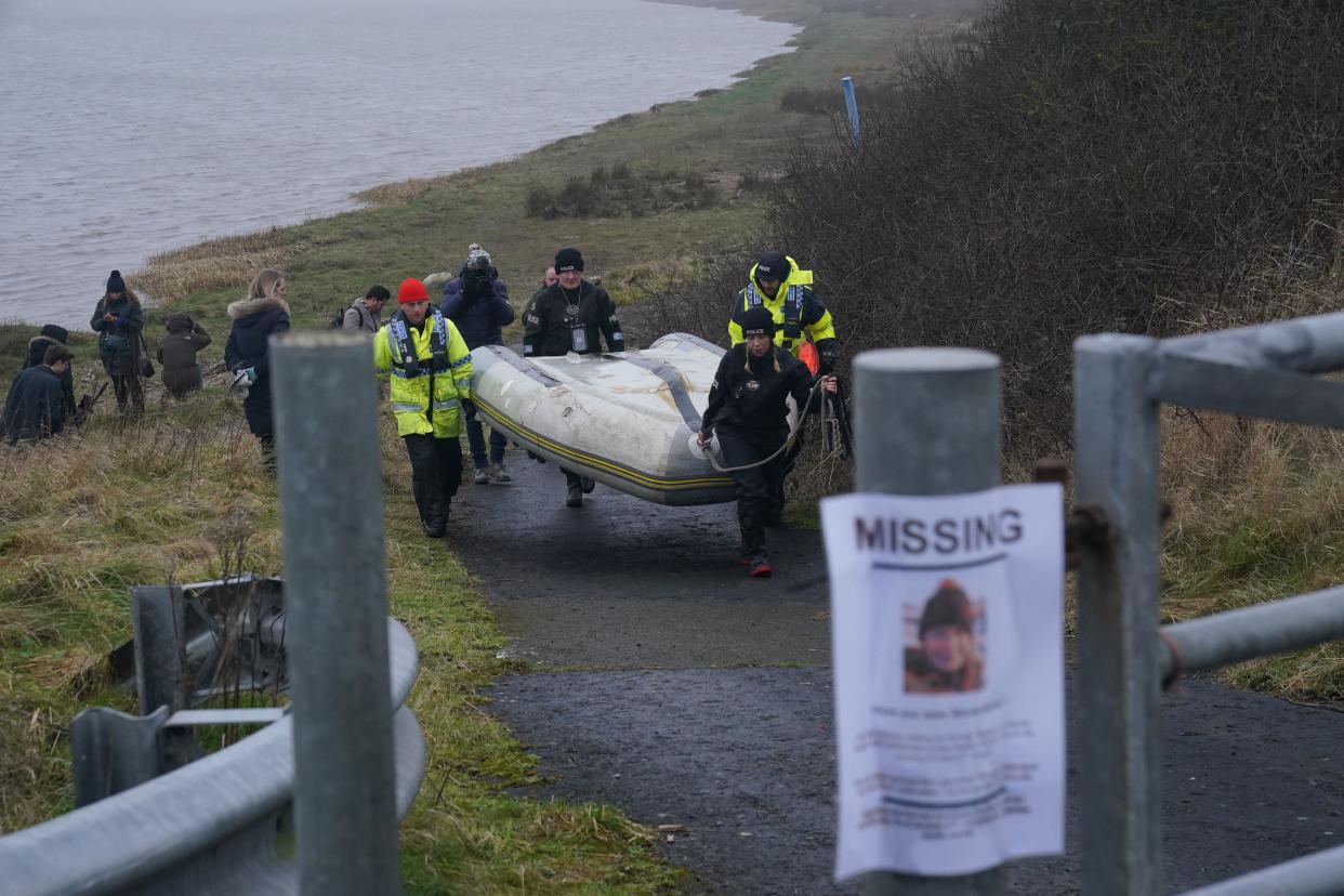 The police Search and Rescue team on the river bank near to Shard Bridge on the River Wyre in Lancashire (PA) (PA Wire)