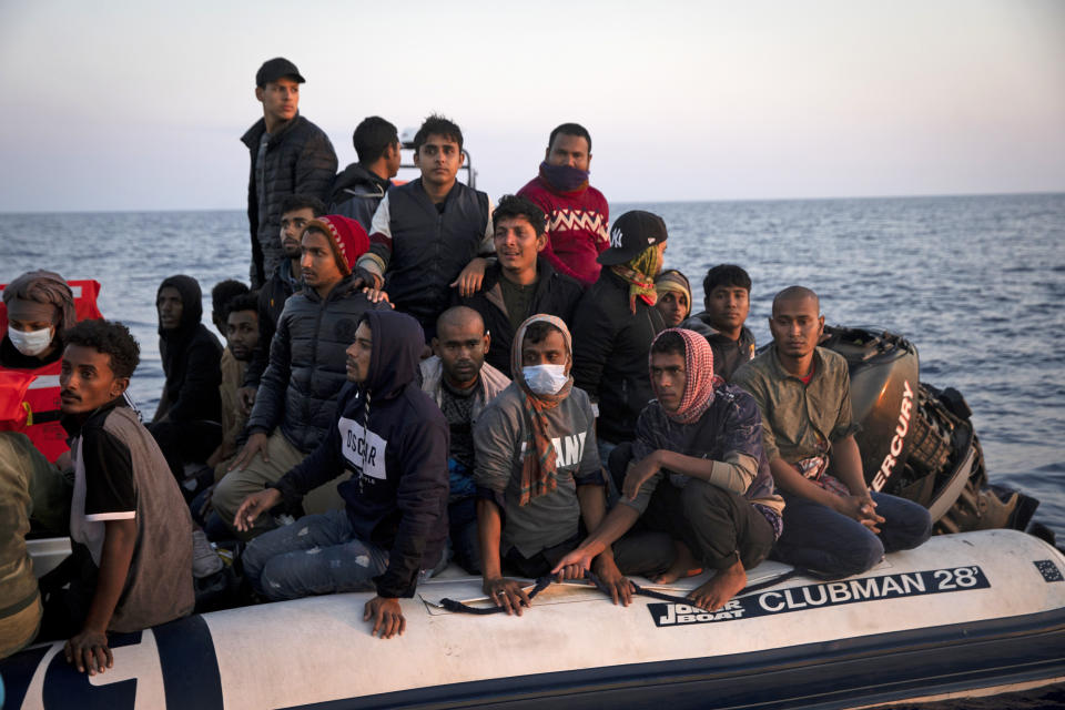 Bangladeshi migrants making their way from Libya to Europe are rescued by the crew of the Geo Barents, a rescue vessel operated by Doctors Without Borders in the Central Mediterranean, on June 12, 2021. (Ed Ou / The Outlaw Ocean Project)