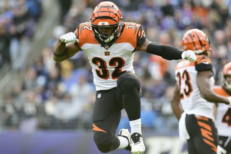 FILE PHOTO: Nov 18, 2018; Baltimore, MD, USA; Cincinnati Bengals running back Mark Walton (32) reacts after tackling Baltimore Ravens wide receiver Chris Moore (not pictured) during the third quarter at M&T Bank Stadium. Mandatory Credit: Tommy Gilligan-USA TODAY Sports