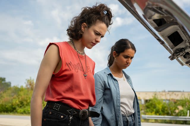 <p>Wilson Webb/Working Title/Focus Features</p> (Left-right:) Margaret Qualley and Geraldine Viswanathan in "Drive-Away Dolls"
