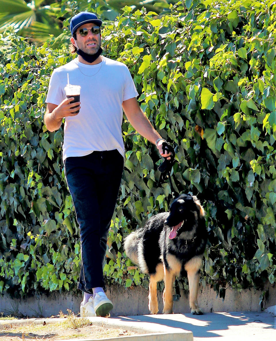 <p>Zachary Quinto grabs a coffee on Friday during a walk with his dog in Los Angeles.</p>