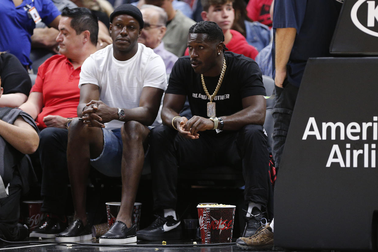 MIAMI, FLORIDA - OCTOBER 23:  NFL wide reciever Antonio Brown looks on courtside during the second half between the Miami Heat and the Memphis Grizzlies at American Airlines Arena on October 23, 2019 in Miami, Florida. NOTE TO USER: User expressly acknowledges and agrees that, by downloading and/or using this photograph, user is consenting to the terms and conditions of the Getty Images License Agreement. (Photo by Michael Reaves/Getty Images)