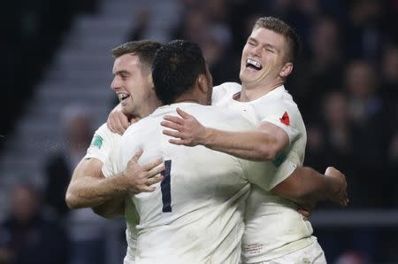 Britain Rugby Union - England v South Africa - 2016 Old Mutual Wealth Series - Twickenham Stadium, London, England - 12/11/16 England's George Ford celebrates scoring their third try with Owen Farrell (R) and Mako Vunipola (C) Action Images via Reuters / Henry Browne