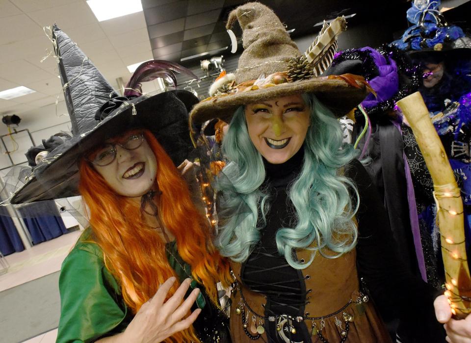 Helen Harrigan of Monroe and Shannon Weimer of Carleton are ready to take part in the witch dance.