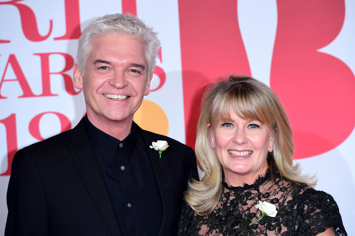 Phillip Schofield and Stephanie Lowe attending the Brit Awards at the O2 Arena, London. (Photo by Ian West/PA Images via Getty Images)