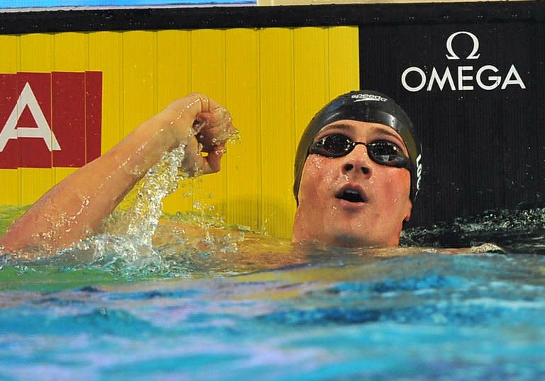 USA's Ryan Lochte competes in the men's 100m individual medley semi-finals during the FINA World Short Course Swimming Championships in Istanbul on December 15, 2012. Lochte set a new short course world record in the 100m individual medley on Saturday when he clocked 50.71sec in the semi-finals at the world championship