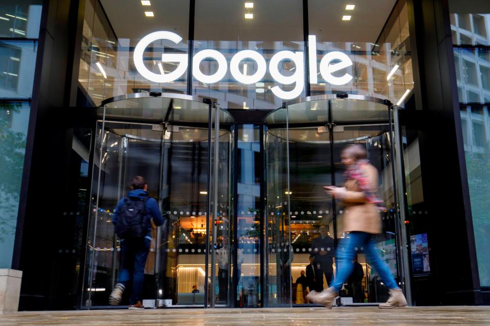 <p>People walk past Google's UK headquarters in London on November 1, 2018. </p> (Photo credit should read TOLGA AKMEN/AFP via Getty Images))