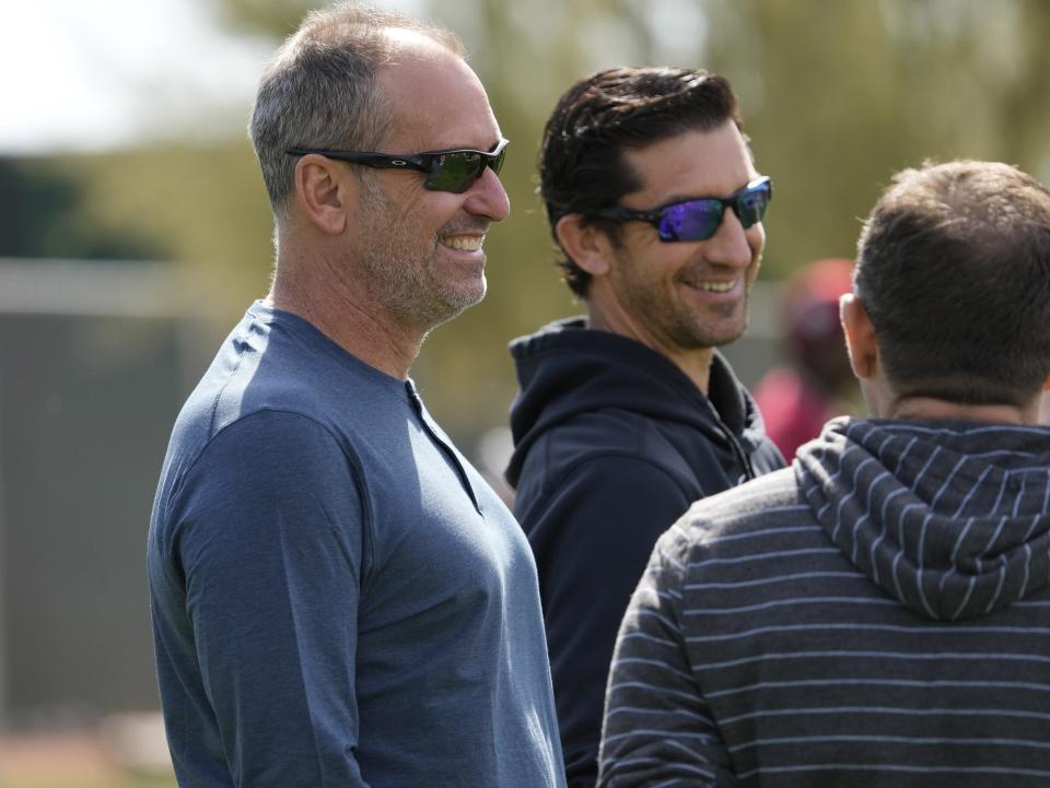 Diamondbacks manager Torey Lovullo (left) and general manager Mike Hazen (center) talk with senior vice-president & assistant general manager Amiel Sawdaye on Feb. 21, 2022 during a select training camp for minor-league players not covered by the Players Association at Salt River Fields.