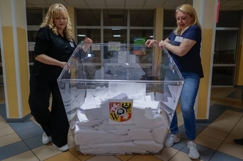 Counting votes begins at a polling station after the Polish Local Government Elections of 2024. Krzysztof Zatycki/ZUMA Press Wire/dpa
