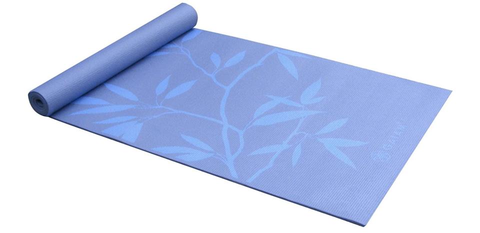 Take your practice to the next level with this mat, which is made with a nonslip material and will help you stay in your poses. <br /><br /><strong>Promising review:</strong> "I've always had problems with various mats. It has been a goldilocks problem. Either it is too thin and my knees hurt from too much contact on hard floors or it is too thick and don't make good contact for standing poses or I feel 'caught' in the mat as I'm doing flow. The 5-mm thickness is just right. It provides enough padding to save my knees or even my hands in downward dog but not too much to inhibit my practice. After six uses I can say I highly recommend this mat." &mdash; <a href="https://amzn.to/3bzyk0t" target="_blank" rel="nofollow noopener noreferrer" data-skimlinks-tracking="5762934" data-vars-affiliate="Amazon" data-vars-asin="none" data-vars-href="https://www.amazon.com/gp/customer-reviews/R2V2EU4WG0J3FO?tag=bfgenevieve-20&amp;ascsubtag=5762934%2C1%2C33%2Cmobile_web%2C0%2C0%2C15990243" data-vars-keywords="cleaning,fast fashion" data-vars-link-id="15990243" data-vars-price="" data-vars-product-id="1" data-vars-product-img="none" data-vars-product-title="Placeholder- no product" data-vars-retailers="Amazon">Amazon Customer<br /><br /></a><strong><a href="https://amzn.to/3uXogGa" target="_blank" rel="noopener noreferrer">Get it from Amazon for $24.58+ (available in 33 designs).</a></strong>