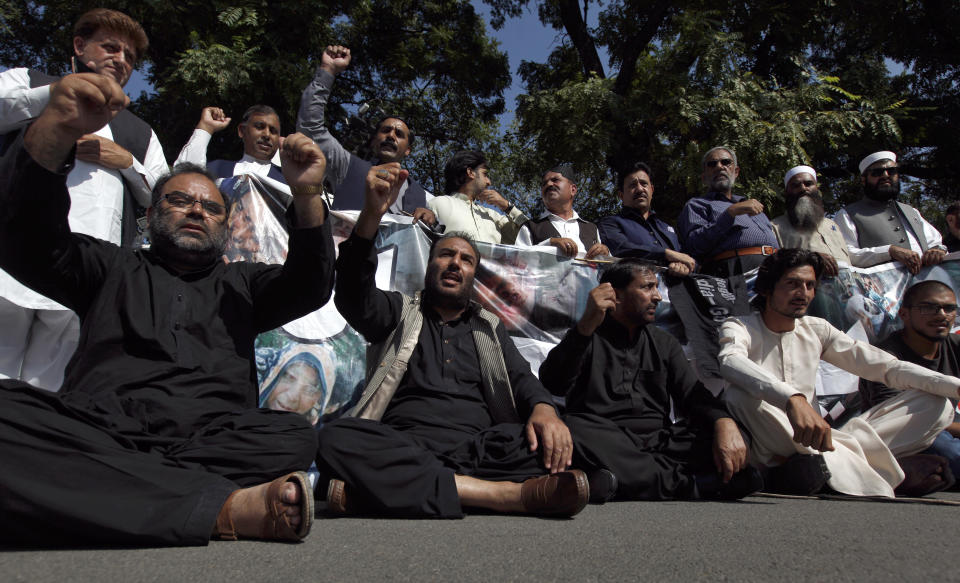 Supporters of All Parties Hurriyat Conference shout slogans during a demonstration to support Black Day, in Islamabad, Pakistan, Saturday, Oct. 27, 2018. The so called Black Day is being observed Oct. 27, throughout Pakistan to express support and solidarity with Kashmiri people in their peaceful struggle for their right to self-determination. (AP Photo/Anjum Naveed)