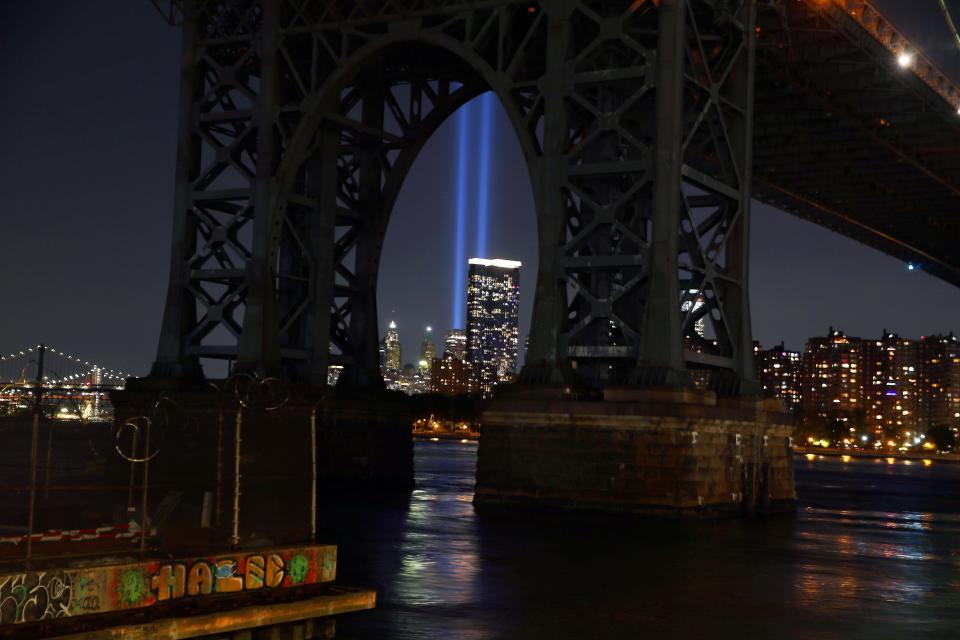 The annual Tribute in Lights in lower Manhattan as seen from under the Williamsburg Bridge in Brooklyn Sept. 11, 2021.