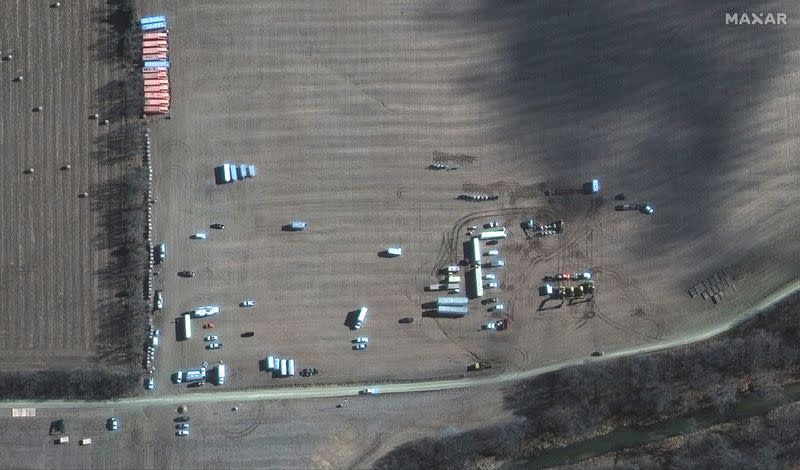 A satellite image shows emergency crews working to clean up crude oil pipeline spill along Mill Creek, in Kansas