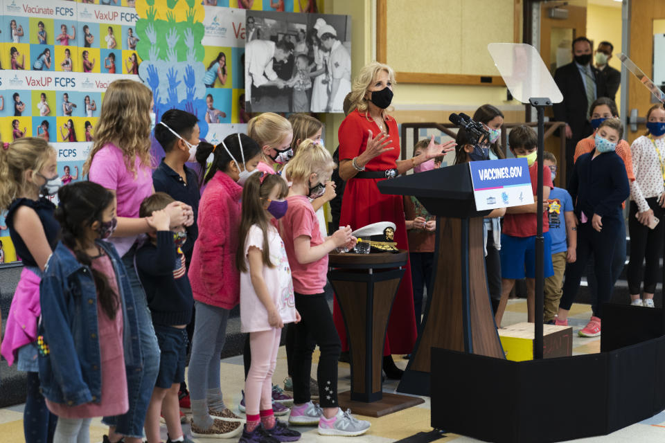 First lady Jill Biden speaks to parents, students, teachers and staff during a visit to a pediatric COVID-19 vaccination clinic at Franklin Sherman Elementary School in McLean, Va., with Surgeon General Dr. Vivek Murthy, to kick off a nationwide effort urging parents and guardians to vaccinate kids ages 5 to 11, Monday, Nov. 8, 2021. (AP Photo/Manuel Balce Ceneta)