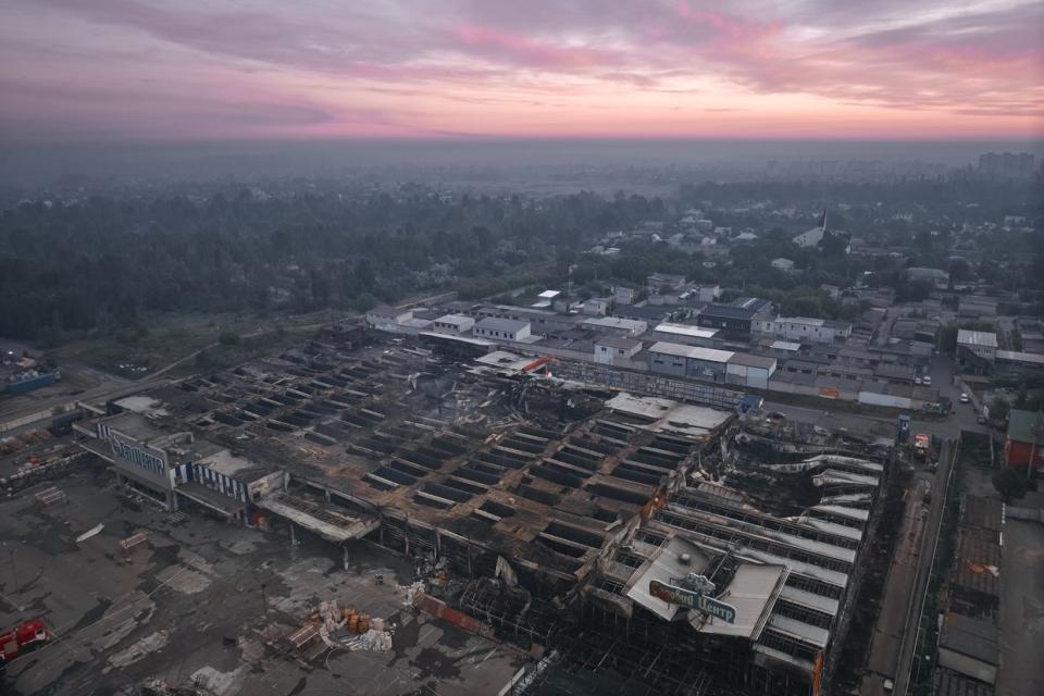 A aerial view of the destroyed construction hypermarket "Epicentr" at dawn on May 26, 2024, in Kharkiv. Russia launched a missile attack on the hypermarket "Epicentr" in the middle of the day on May 25, killing 16 people. (Photo by Kostiantyn Liberov/Libkos/Getty Images)