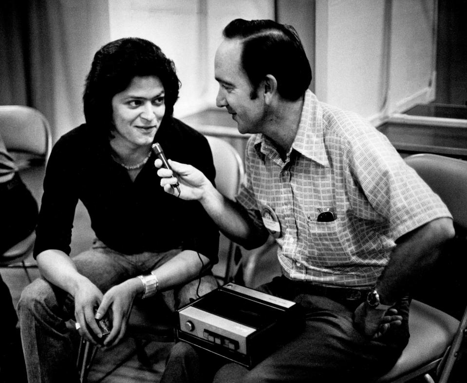 Country music singer Johnny Rodriguez, left, answer questions for deejay Gary Welch of WAPR in Avon Park, Fla. Welch at first introduced Rodriguez as Johnny Paycheck during the taping sessions in the Municipal Auditorium Oct. 19, 1973.