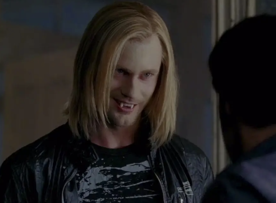 Alexander Skarsgard with vampire teeth