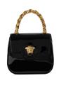 <p><a class="link " href="https://www.farfetch.com/uk/shopping/women/versace-la-greca-leather-tote-item-16816883.aspx?storeid=11282" rel="nofollow noopener" target="_blank" data-ylk="slk:SHOP NOW;elm:context_link;itc:0;sec:content-canvas">SHOP NOW</a></p><p>You can always rely on Versace to inject a little fun into your wardrobe, and this patent leather bag will do just that. The style has an attachable shoulder strap too.</p><p>Leather bag, £1,040, Versace at <a href="https://www.net-a-porter.com/en-gb/shop/product/versace/bags/mini-bags/le-medusa-mini-chain-embellished-patent-leather-tote/34344356237430089" rel="nofollow noopener" target="_blank" data-ylk="slk:Net-a-Porter;elm:context_link;itc:0;sec:content-canvas" class="link ">Net-a-Porter</a></p>