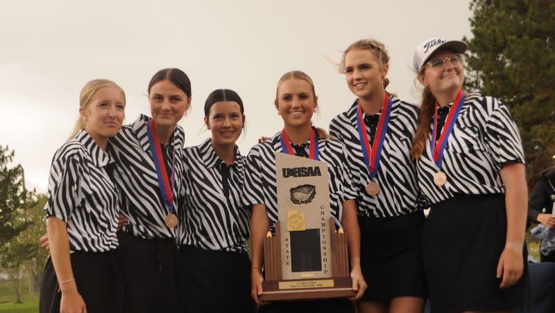 Monticello’s girls golf team celebrates its first state golf championship on Wednesday, May 17, 2022, in Richfield, Utah.