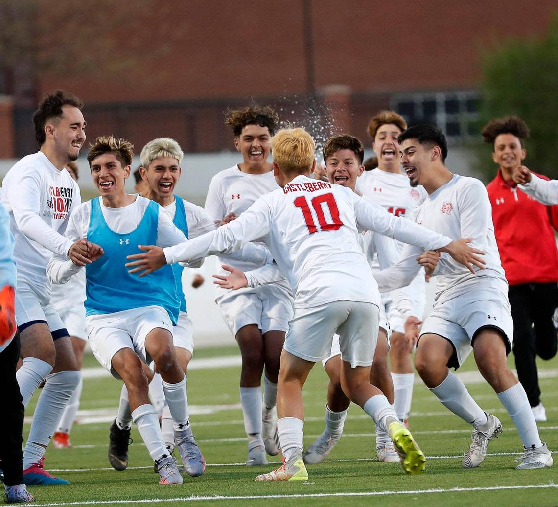 Team mates greet Castleberry’s Isaac Chavez (10) on the field after he scored the winning goal in a shoot out during a UIL 4A Region 1 semi-final playoff soccer game at NISD Stadium in Justin, Texas, Friday, Apr. 08, 2022. Castleberry defeated San Elizario 5-4 in shoot out. (Special to the Star-Telegram Bob Booth)