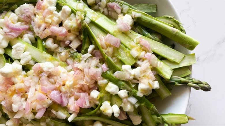 Asparagus salad in white bowl