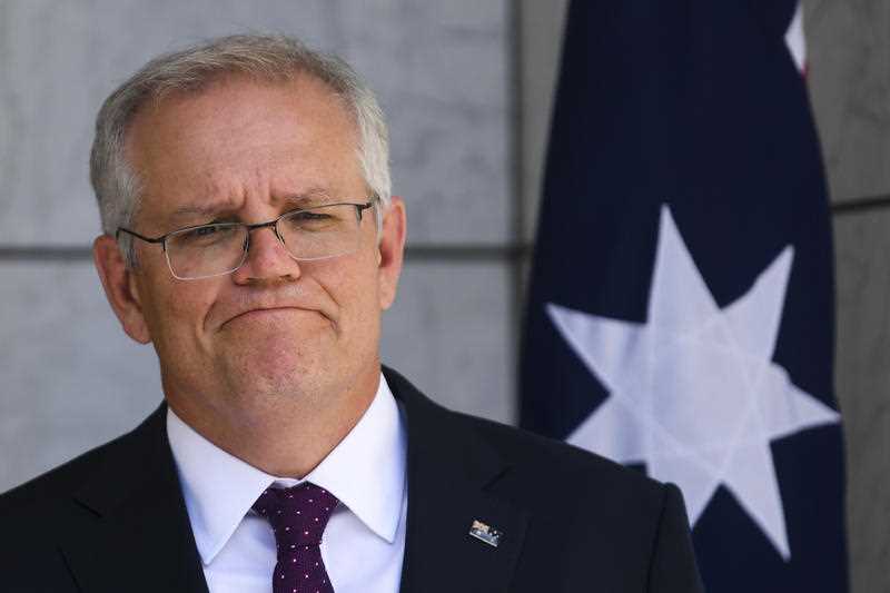 Australian Prime Minister Scott Morrison speaks during a press conference following a national cabinet meeting, at Parliament House in Canberra.