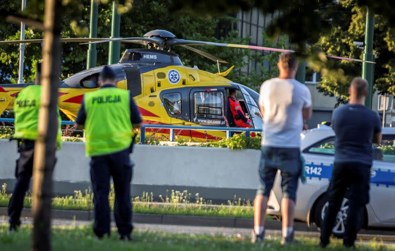 A rescue helicopter is seen on the site where Dutch cyclists Fabio Jakobsen and Dylan Groenewegen crashed in Katowice